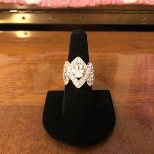 Women’s size 8 gold band ring with CZ stones
